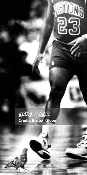 Pigeon retreats from Detroit Pistons' Mark Aguirre during the third quarter of Game Two of the second round of the 1991 NBA playoffs between the...