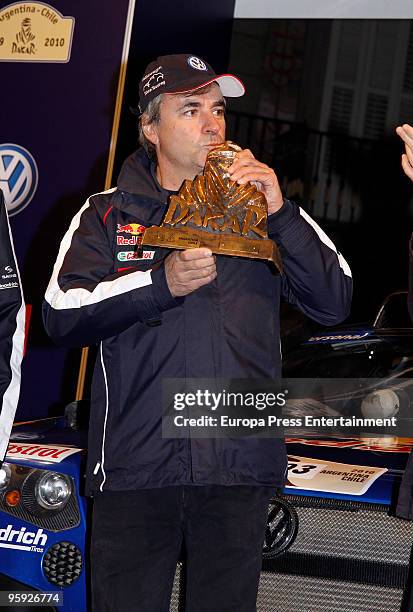 Winner of the 2010 Dakar Rally in Chile, Carlos Sainz celebrates his victory with fans on January 21, 2010 in Madrid, Spain.