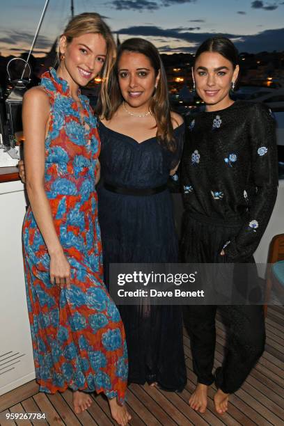 Martha Hunt, Laura Chavez and Bambi Northwood-Blyth, wearing Lark and Berry, attend the Lark and Berry launch party on a private yacht during the...