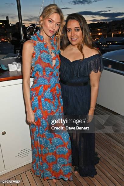 Martha Hunt and Laura Chavez attend the Lark and Berry launch party on a private yacht during the 71st Cannes Film Festival on May 16, 2018 in...