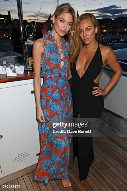 Martha Hunt and Jennifer Yepez attend the Lark and Berry launch party on a private yacht during the 71st Cannes Film Festival on May 16, 2018 in...