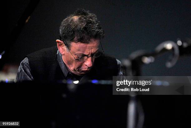 Phillip Glass performs at the Apple Store Soho on January 21, 2010 in New York City.