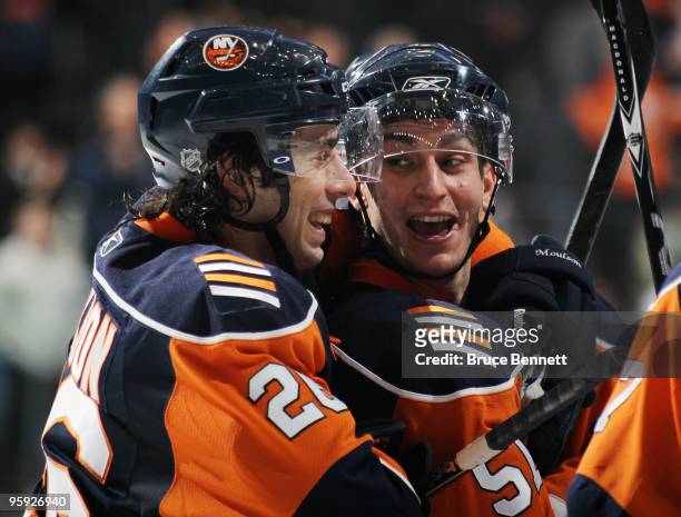 Matt Moulson and Frans Nielsen of the New York Islanders celebrate their win over the Florida Panthers at the Nassau Coliseum on January 21, 2010 in...