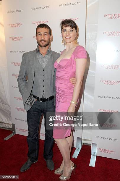 Actors Andy Whitfield and Lucy Lawless attend the Cinema Society and John & Aileen Crowley screening of ''Extraordinary Measures''>> at the School of...