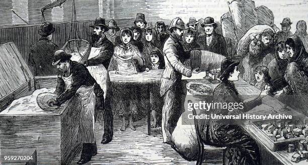 Engraving depicting famine in Ireland: A couple hand out food to the starving. Dated 19th century.
