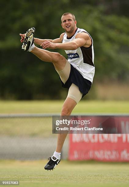 Beau Muston of the Hawks kicks during a Hawthorn Hawks AFL training session at Toomuc Recreation Reserve on January 22, 2010 in Melbourne, Australia.