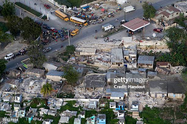 In this handout image provided by the United Nations Stabilization Mission in Haiti , an arial photograph shows the destruction of a town 40...