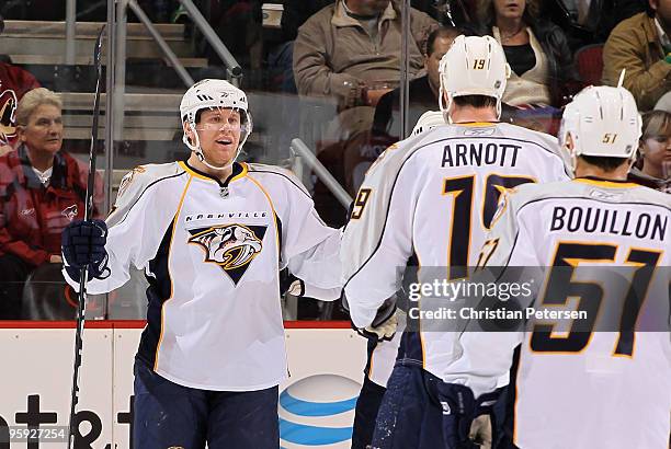 Patric Hornqvist of the Nashville Predators celebrates with teammates after scoring a second period goal against the Phoenix Coyotes during the NHL...