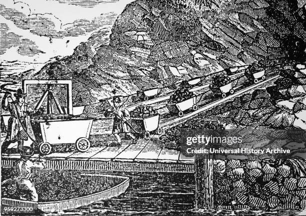 Engraving depicting the process of mining of Anthracite. Wagons of Anthracite are loaded and brought to the barges. Dated 19th century.