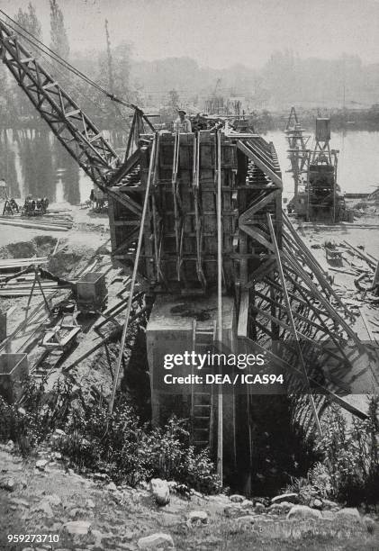 Installation of a caisson, a watertight retaining structure used to work on the foundations of a bridge pier, photo from Les Merveilles des Sciences...