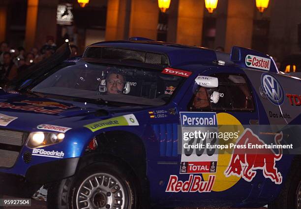 Mayor Alberto Ruiz-Gallardon greets the winner of the 2010 Dakar Rally in Chile, Carlos Sainz to celebrate his victory with fans on January 21, 2010...