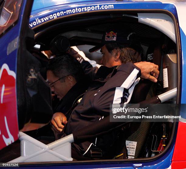 Mayor Alberto Ruiz-Gallardon greets the winner of the 2010 Dakar Rally in Chile, Carlos Sainz to celebrate his victory with fans on January 21, 2010...