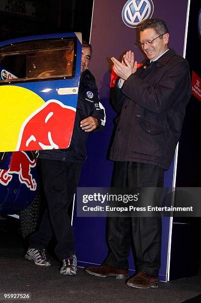 Mayor Alberto Ruiz-Gallardon greets the winner of the 2010 Dakar Rally in Chile, Carlos Sainz to celebrate his victory with fans on January 21, 2010...