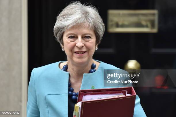 British Prime Minister Theresa May leaves 10 Downing Street as she heads to the Parliament to attend the weekly Prime Minister Questions session ,...