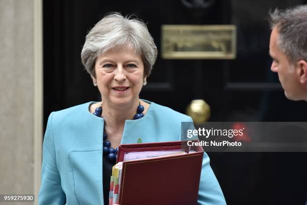 British Prime Minister Theresa May leaves 10 Downing Street as she heads to the Parliament to attend the weekly Prime Minister Questions session ,...