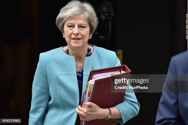 British Prime Minister Theresa May leaves 10 Downing Street as she heads to the Parliament to attend the weekly Prime Minister Questions session ,...