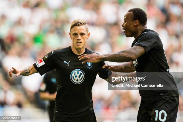 Soren Rieks of Malmo FF celebrates scoring the opening goal with teamate Carlos Strandberg during an Allsvenskan match between Hammarby IF and Malmo...