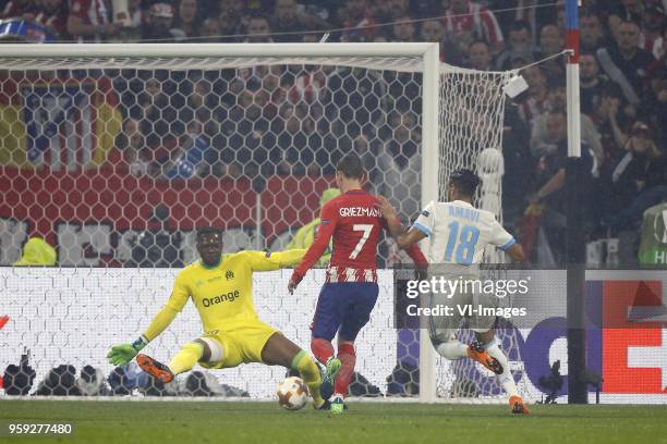 Goalkeeper Steve Mandanda of Olympique Marseille, Antoine Griezmann of Club Atletico de Madrid, Jordan Amavi of Olympique Marseille 0-2 during the...