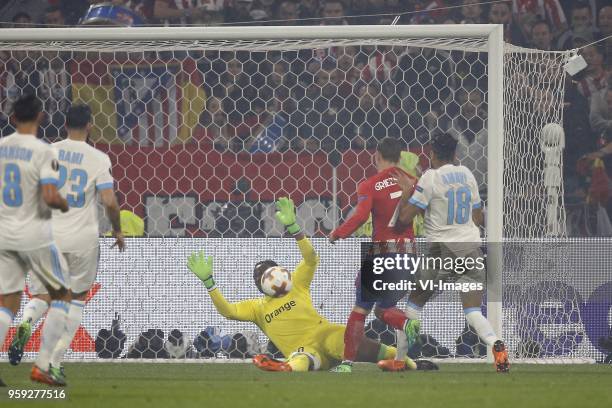 Morgan Sanson of Olympique Marseille, Adil Rami of Olympique Marseille, goalkeeper Steve Mandanda of Olympique Marseille, Antoine Griezmann of Club...