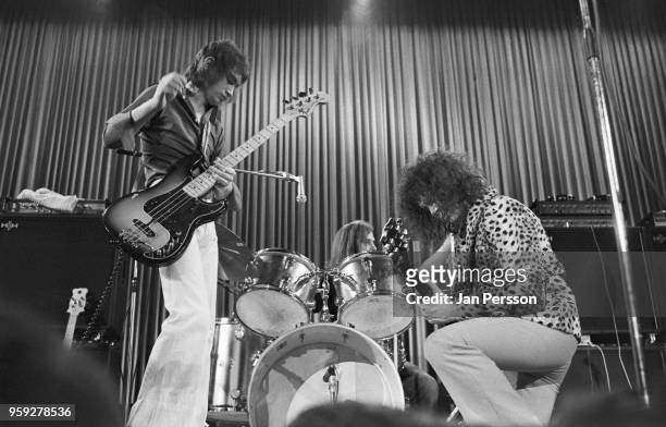 Bass player Steve Currie , singer and guitarist Marc Bolan and drummer Bill Legend of T Rex performing in Copenhagen, Denmark, March 1973.