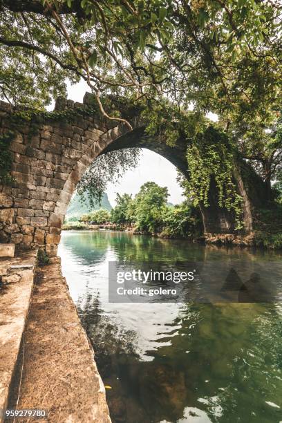 dragon bridge in yanshuo in china - li river stock pictures, royalty-free photos & images