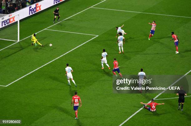 Gabi of Atletico Madrid scores his team's third goal of the game during the UEFA Europa League Final between Olympique de Marseille and Club Atletico...