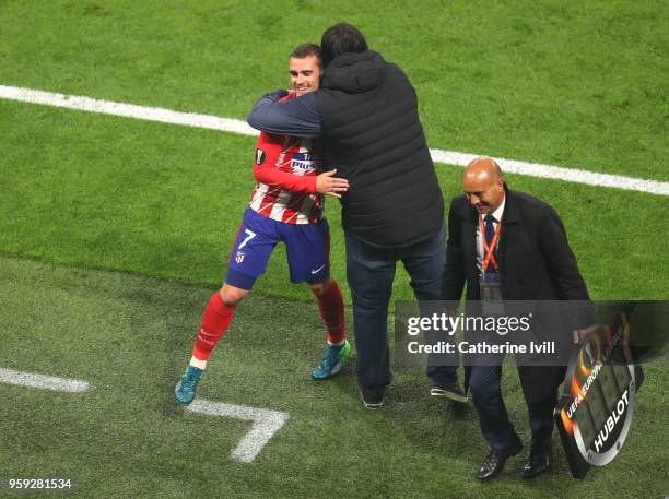 Antoine Griezmann of Atletico Madrid celebrates with Atletico Madrid assistant head coach German Burgos during the UEFA Europa League Final between...