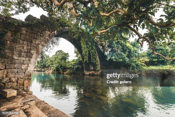 dragon bridge in yanshuo in china - asia village river stock pictures, royalty-free photos & images