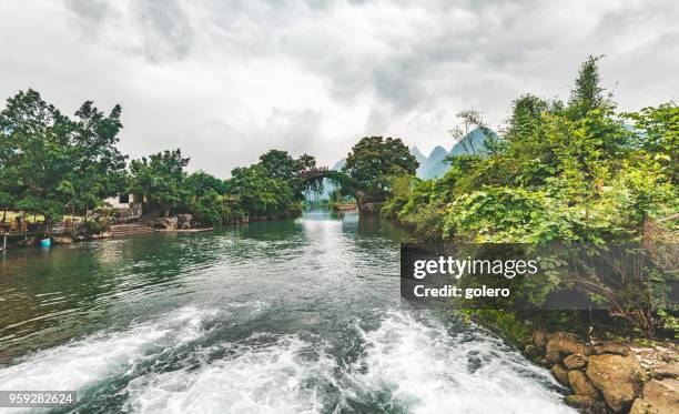dragon bridge in yanshuo in china - xingping stock pictures, royalty-free photos & images