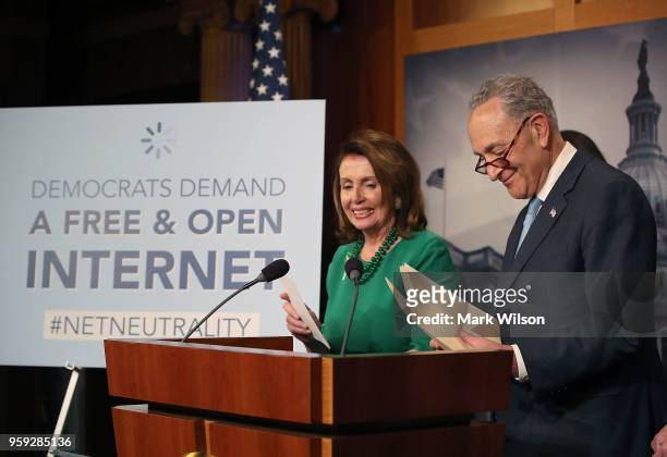 Senate Majority Leader Charles Schumer , with House Minority Leader Nancy Pelosi looking on, speaks at a press conference at the Capitol Building on...