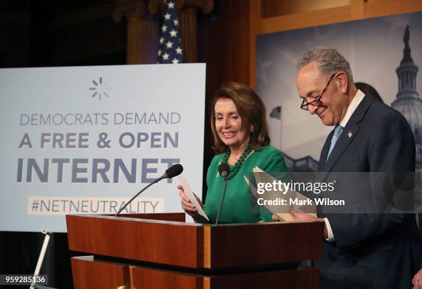 Senate Majority Leader Charles Schumer , with House Minority Leader Nancy Pelosi looking on, speaks at a press conference at the Capitol Building on...