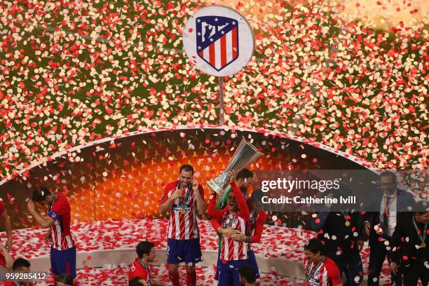 Antoine Griezmann of Atletico Madrid lifts The Europa League trophy after the UEFA Europa League Final between Olympique de Marseille and Club...