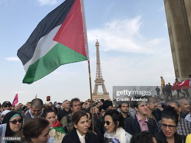 People take part in a rally against United States' plans to relocate the U.S. Embassy from Tel Aviv to Jerusalem and Israeli violence in Gaza at the...