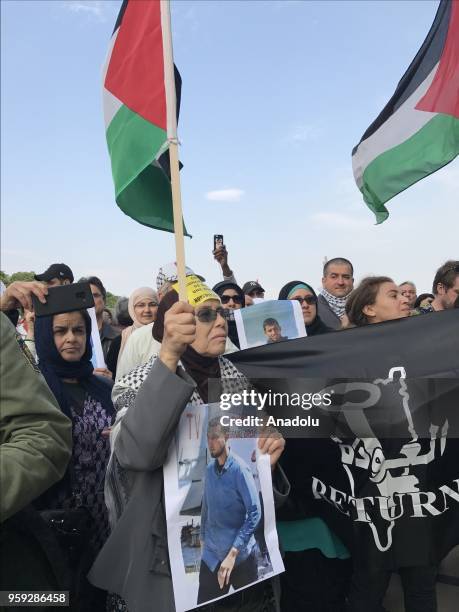 People take part in a rally against United States' plans to relocate the U.S. Embassy from Tel Aviv to Jerusalem and Israeli violence in Gaza at the...