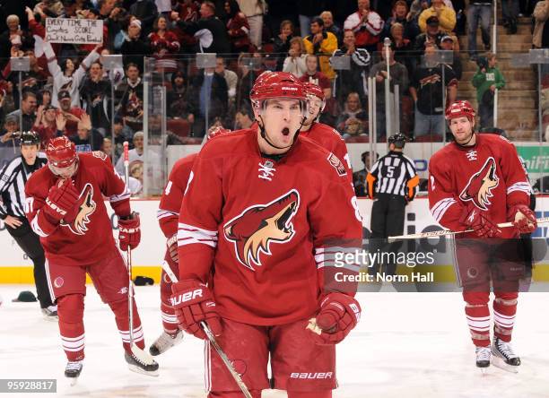 Scottie Upshall of the Phoenix Coyotes celebrates his hat trick against the Nashville Predators with his teammates on January 21, 2010 at Jobing.com...