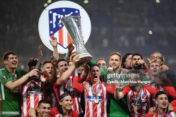 Atletico Madrid players celebrate with The Europa League trophy after the UEFA Europa League Final between Olympique de Marseille and Club Atletico...