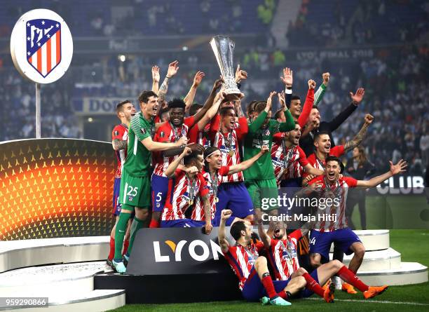 Atletico Madrid players celebrate with The Europa League trophy after the UEFA Europa League Final between Olympique de Marseille and Club Atletico...