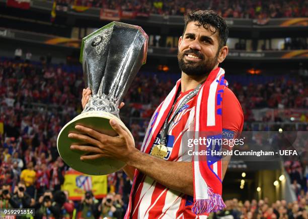 Diego Costa of Atletico Madrid celebrates with the trophy following the UEFA Europa League Final between Olympique de Marseille and Club Atletico de...