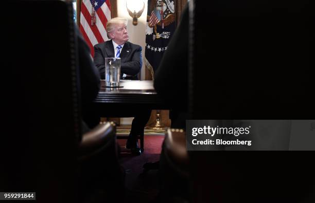 President Donald Trump listens during a meeting with California leaders and public officials in the Cabinet Room of the White House in Washington,...