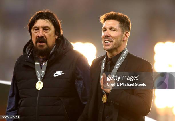 Diego Simeone, Coach of Atletico Madrid and his assistant German Burgos celebrate following the UEFA Europa League Final between Olympique de...