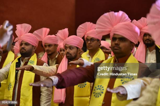 Students take oath with Vice President M. Venkaiah Naidu during the 3rd convocation ceremony of Makhanlal Chaturvedi National University of...
