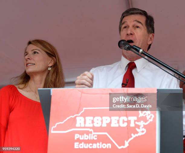 Governor Roy Cooper, D-NC address the crowd during the Rally for Respect outside the North Carolina Legislative Building on May 16, 2018 in Raleigh,...