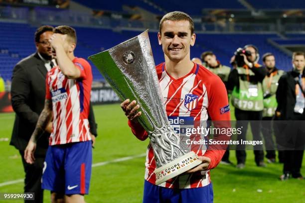 Antoine Griezmann of Atletico Madrid celebrates the championship with the trophy during the UEFA Europa League match between Olympique Marseille v...