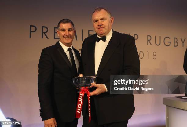 Dean Richards, of Newcastle Falcons receives the Ricoh Director of Rugby of the Season award from Chas Moloney of Ricoh during the Premiership Rugby...