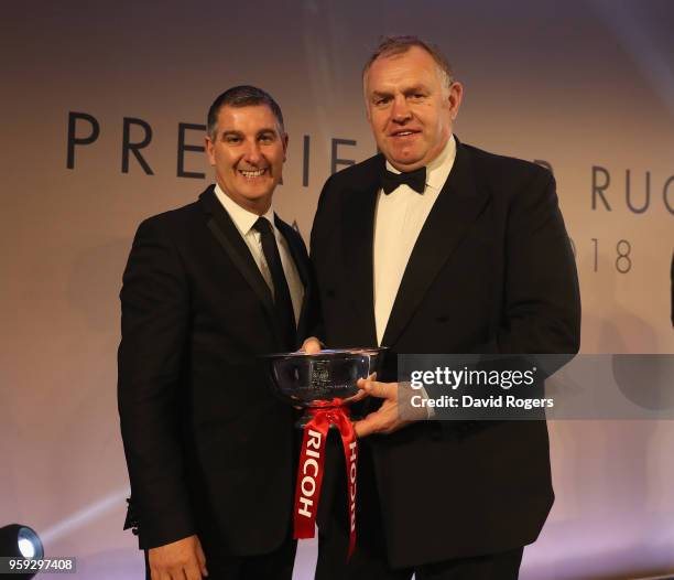 Dean Richards, of Newcastle Falcons receives the Ricoh Director of Rugby of the Season award from Chas Moloney of Ricoh during the Premiership Rugby...