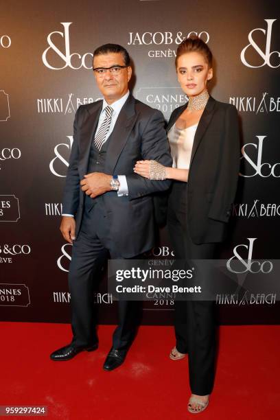 Jacob Arabo and Anna Andreas attend the Jacob & Co Cannes 2018 party at Nikki Beach on May 16, 2018 in Cannes, France.