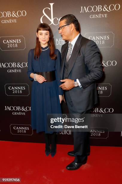 Ëstrid Bergs-Frisbey and Jacob Arabo attends the Jacob & Co Cannes 2018 party at Nikki Beach on May 16, 2018 in Cannes, France.