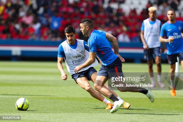 Yuri Berchiche and Hatem Ben Arfa of PSG during the training session of Paris Saint Germain at Parc des Princes on May 16, 2018 in Paris, France.
