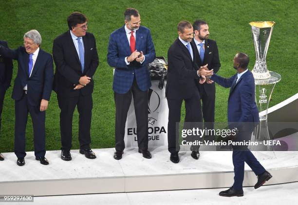 President Aleksander Ceferin and King Felipe of Spain greet Eric Abidal after the UEFA Europa League Final between Olympique de Marseille and Club...