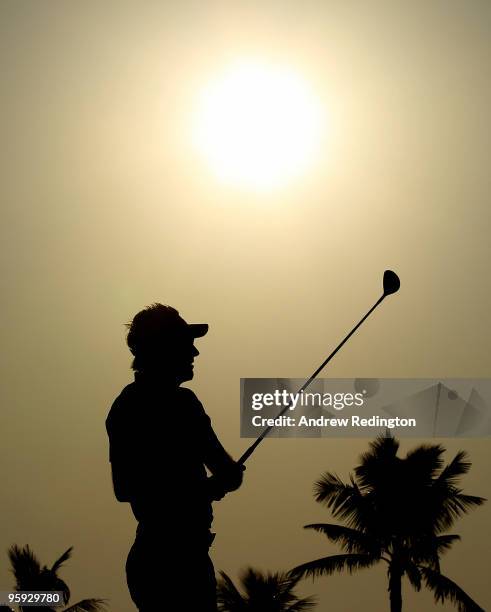 Ian Poulter of England plays his second shot on the tenth hole during the second round of The Abu Dhabi Golf Championship at Abu Dhabi Golf Club on...